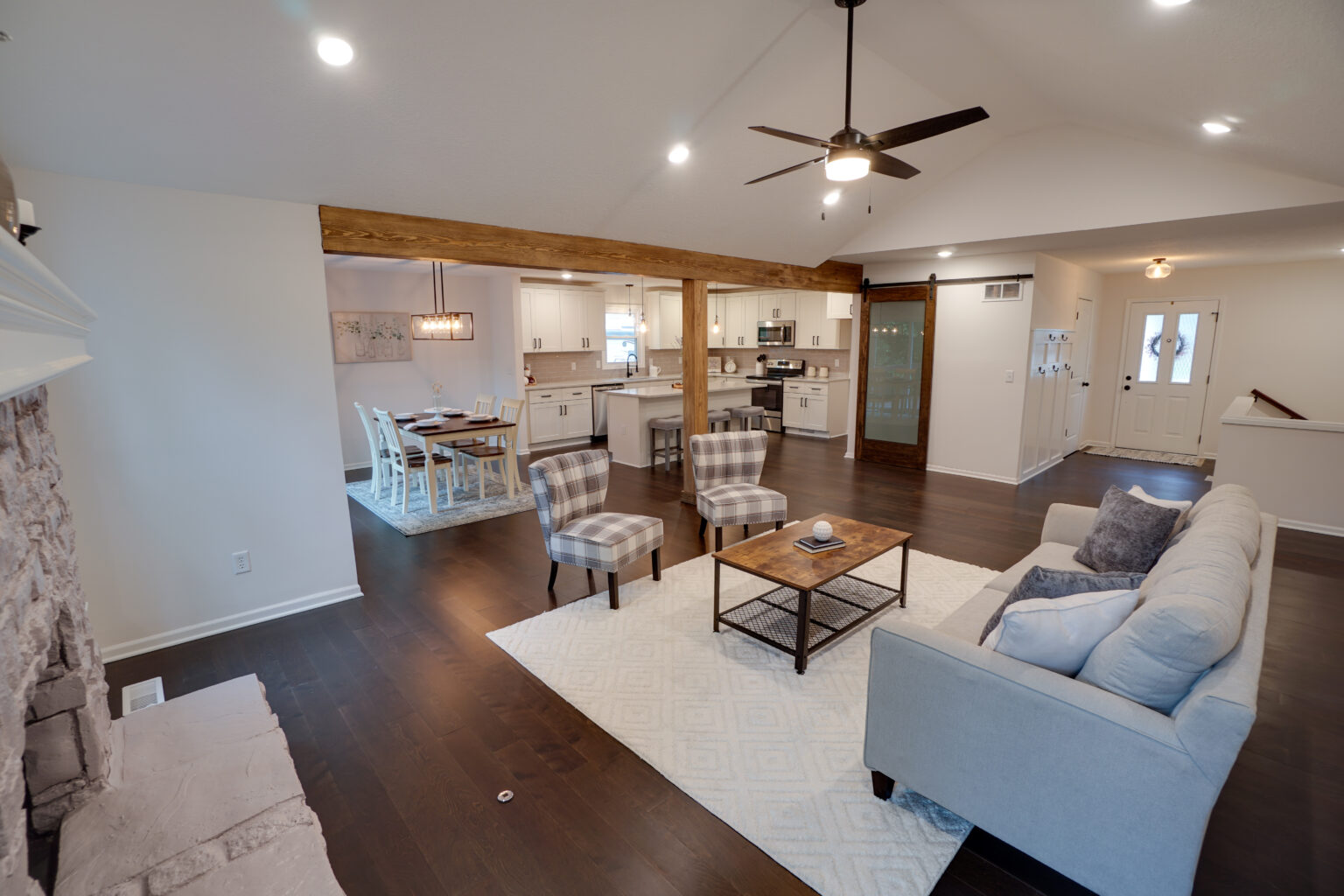 a kitchen, dining area, and living room